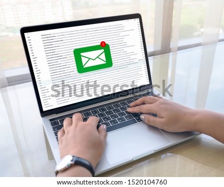 Business woman's hands are using Laptop Computer with E-Mail Communication Connection Message Online Chat Social Text Global Letters , business concept, Laptop mockup with clipping path on screen.