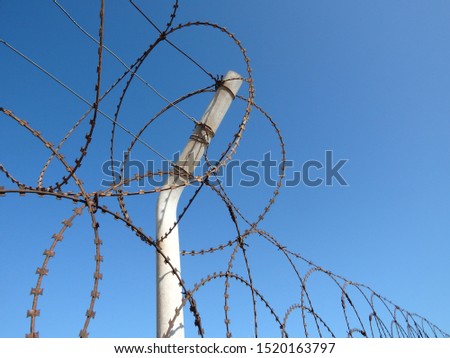 Prison exterior abstract concept with fenced wall