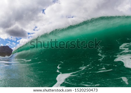huge dramatic green wave breaking