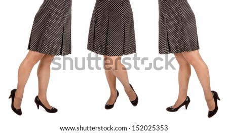 Woman Wearing Polka Dot Mini Skirt and Black Suede Pumps Isolated
