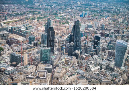 Aerial view of London skyscrapers as seen from helicopter.