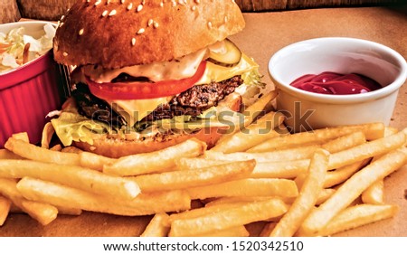 Fresh fried potatoes tasty burger french fries ketchup sauce on table