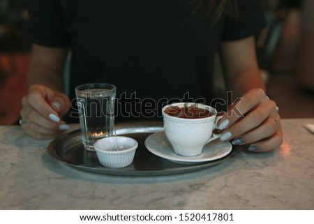 cup of Turkish coffee on table