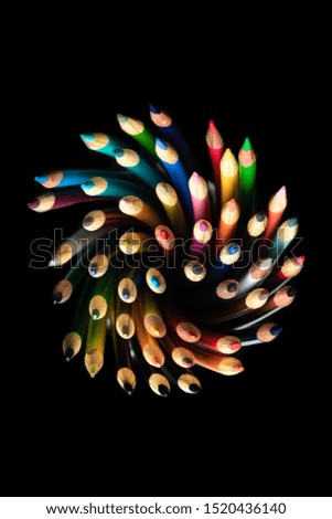  colored pencils at work school office  
 college kids colorful education play room for text art project supplies draw learn on black background teacher school design pattern fun artist classroom 