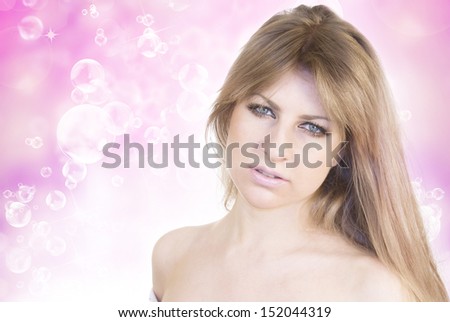 Beautiful Girl With Soap bubbles. Spa. Hair Care concept
