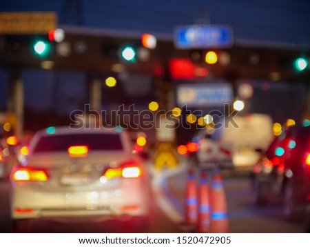 blurred traffic scene at night on the highway inbound