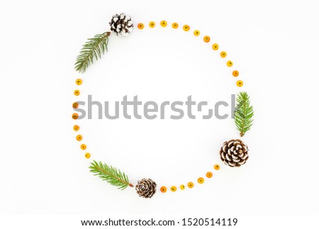 December frame mockup from christmas tree branches and cones isolated on with with copy space