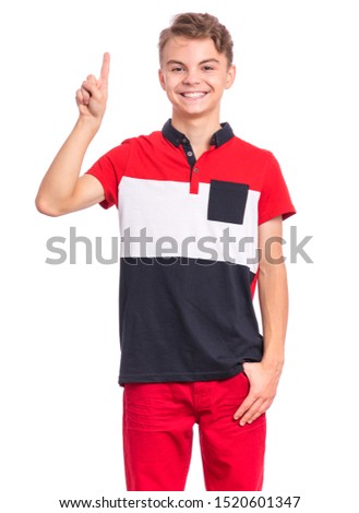 Portrait of happy teen boy showing one palm - 1 finger, isolated on white background. Happy smiling child doing gesture of number One. Series of photos count from 1 to 10.