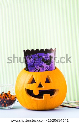 Halloween carved squash bright still life background. Holiday party
