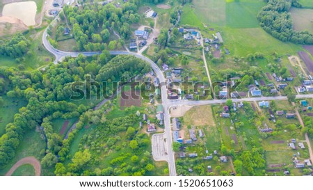 Aerial view from drone on Akniste in Latvia. Beautiful landscapes on small town fields and forests.