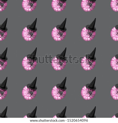 Abstract halloween seamless pattern for girls or boys. Creative template with pink pumpkins in a hat. Cool ghostly wallpaper for textile and fabric. Halloween fashion colorful vibrant picture