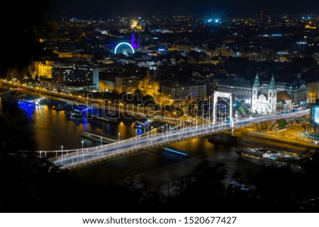The Elisabeth Bridge crossing the Danube River at night pictured from above. Budapest, Hungary