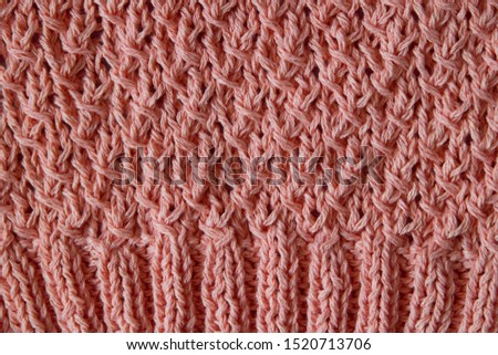 Texture of knitted pink horizontal crocheted canvas with elastic
