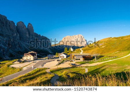Passo di val Gardena with mountain view in background at sunrise. Dolomites Alps. Italy