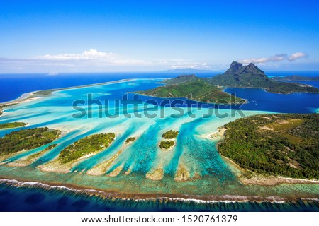 Bora Bora Lagoon and Mt.Otemanu Royalty-Free Stock Photo #1520761379