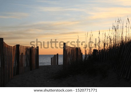 Early morning at the beach Royalty-Free Stock Photo #1520771771