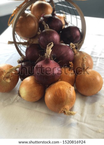 Close up photos of onions and peppers