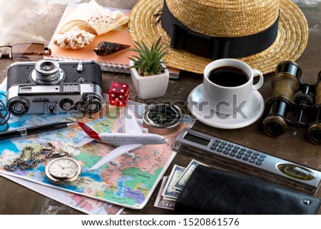 Accessories and items for traveling on the table in composition