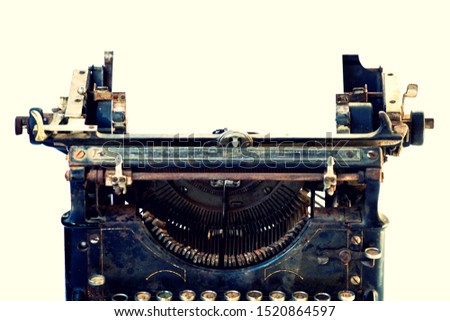 Antique typewriter. Vintage typewriter machine closeup photo.