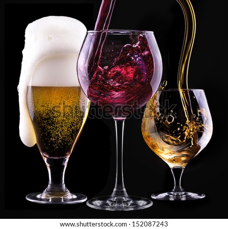 alcohol drinks set isolated on a black background - beer,wine,scotch