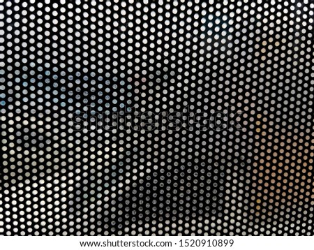 UV perforated window film. Grid film for installation in public transport vehicles to filter the light and can see the outside.