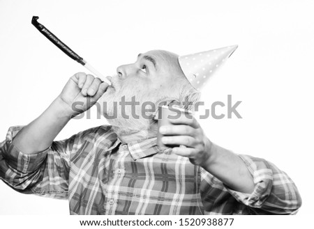 Man bearded grandpa with birthday cap and drink cup. Birthday crazy party. Ideas seniors birthday celebrations. Grandfather graybeard blowing party whistle. Getting older is still fun. Elderly people.