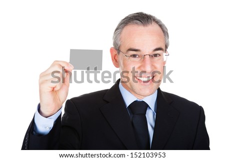 Happy Mature Businessman Showing Blank Visiting Card Over White Background