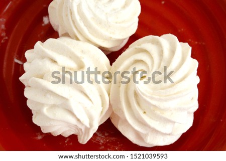 Meringue Marshmallow or Zephyr. View from above. sweet homemade low-calorie marshmallows or zephyr. dessert image.
