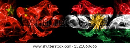 China vs Kurdistan, Kurdish smoke flags placed side by side. Thick colored silky smoke flags of Chinese and Kurdistan, Kurdish