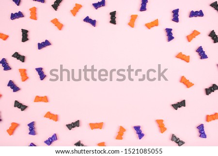 Halloween holiday background with bats. Flat lay, top view.