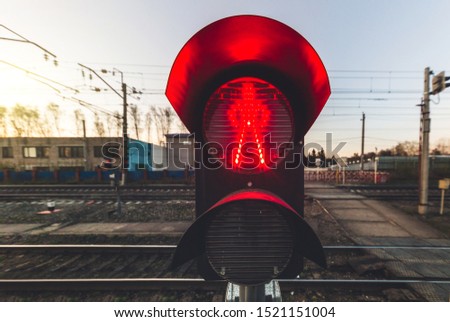red signal of simophore near the railway tracks