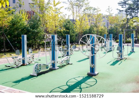 Park outdoor exercise equipment in Korea. Athletic facilities in the apartment complex. Royalty-Free Stock Photo #1521188729