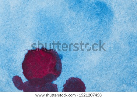 Blue abstract with red stains watercolour ink backdrop