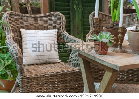 Rattan chair in the garden retro vintage style interior decoration