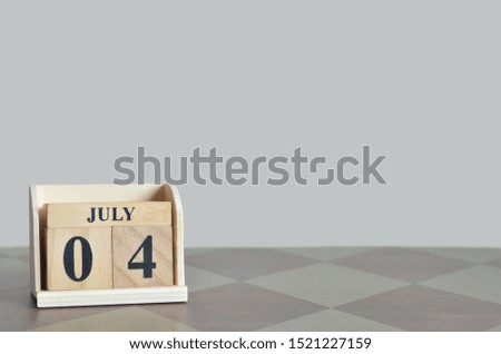 Empty Background with number cube on the table, July 4.