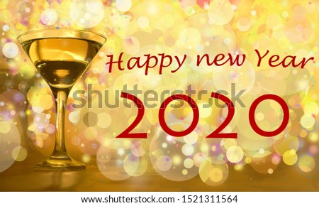 large picture of a wine steemed glass with clear white wine and bubbles atmosphere fot greetings and new year