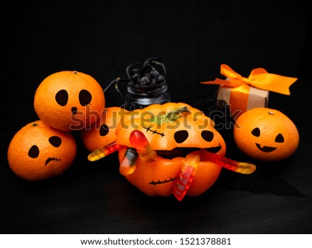 Creative Halloween decoration idea with fruits.