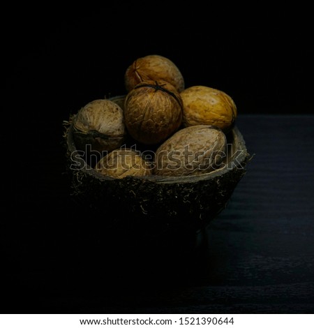 close up picture of nuts in the coconut shell