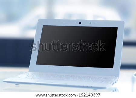 thin laptop on office desk 
