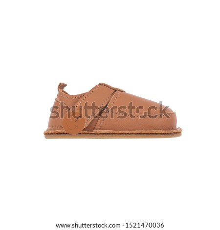 brown leather  baby shoes isolated on perfect white background, stock photography