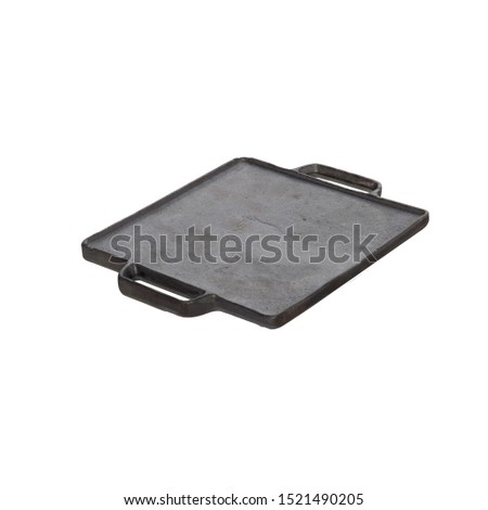 Empty cast iron frying board, iron cast grill pan isolated  on perfect white background, stock photography