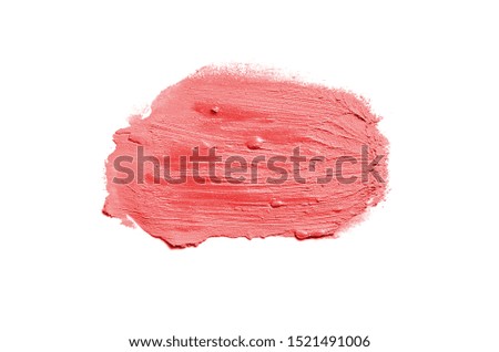 Smear and texture of lipstick or acrylic paint isolated on white background. Stroke of lipgloss or liquid nail polish swatch smudge sample. Element for beauty cosmetic design. Red color