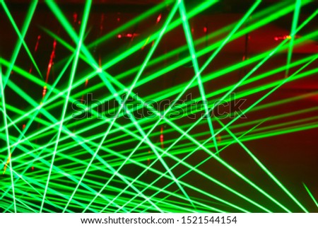 Green lasers on the party as background.