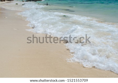 Waves hit the seashore in Playa Blanca, Cartagena