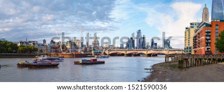 Very high resolution panoramic image of London at sunset with the river Thames, St Paul Cathedral, Blackfriars Bridge and the City - All logos and trademarks removed