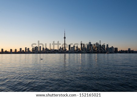 Toronto skyline view from the Lake Ontario (Building signs are removed or blurred)