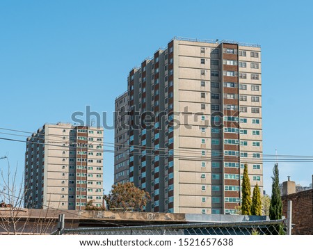 External view of housing commission apartment flats in Melbourne. This public housing is built by the government to help people that cannot afford the cost of renting or buying a property. Royalty-Free Stock Photo #1521657638