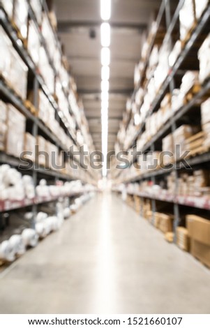 blurred brown goods boxes on full shelves in warehouse storage factory . perspective background with space for business about logistics shipping and wholesale concept . vertical picture .
