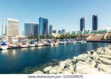 San Diego Marina Harbor. Luxury Yachts in Embarcadero Marina Park  With San Diego Skyline and Convention Center in the Background