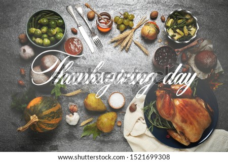 Flat lay composition with delicious roasted turkey on grey table. Happy Thanksgiving day